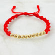 Pulsera Roja Bolas 1.05gr / Oro Amarillo 18K *