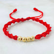 Pulsera Roja Bolas 0.75gr / Oro Amarillo 18K *