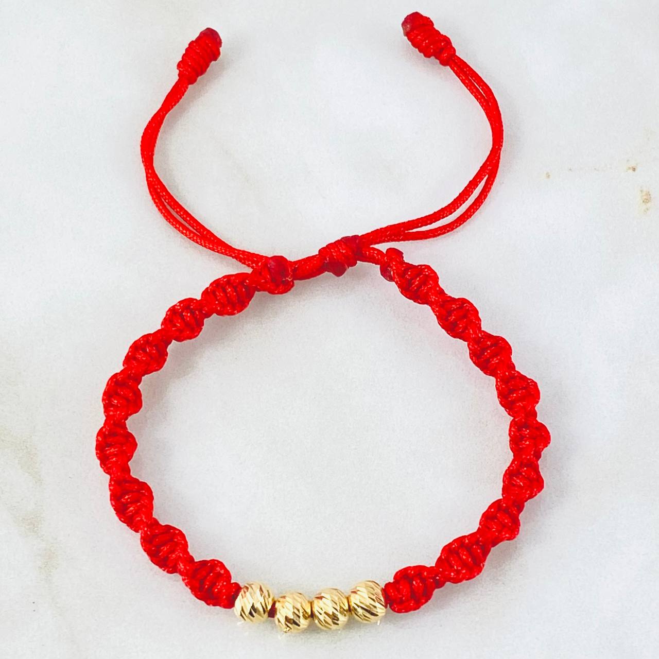 Pulsera Roja Bolas 0.75gr / Oro Amarillo 18K *