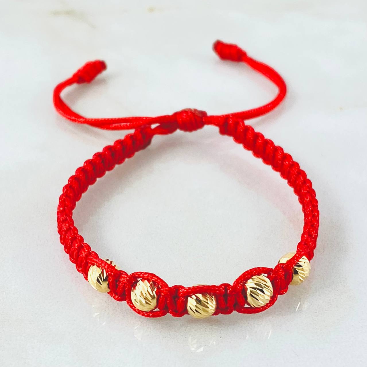 Pulsera Roja Bolas 0.9gr / Oro Amarillo 18K *
