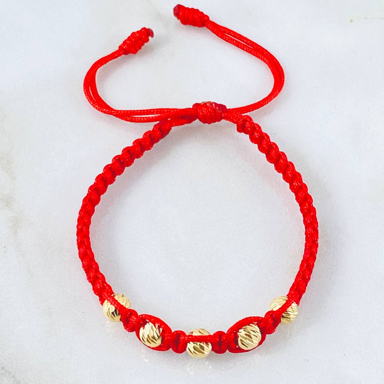 Pulsera Roja Bolas 0.9gr / Oro Amarillo 18K *
