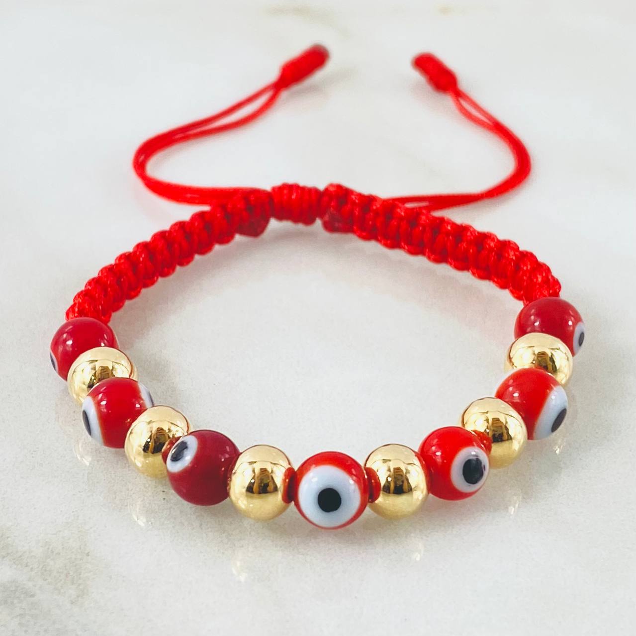 Pulsera Roja Ojos Turcos 1.25gr / Oro Amarillo 18K *