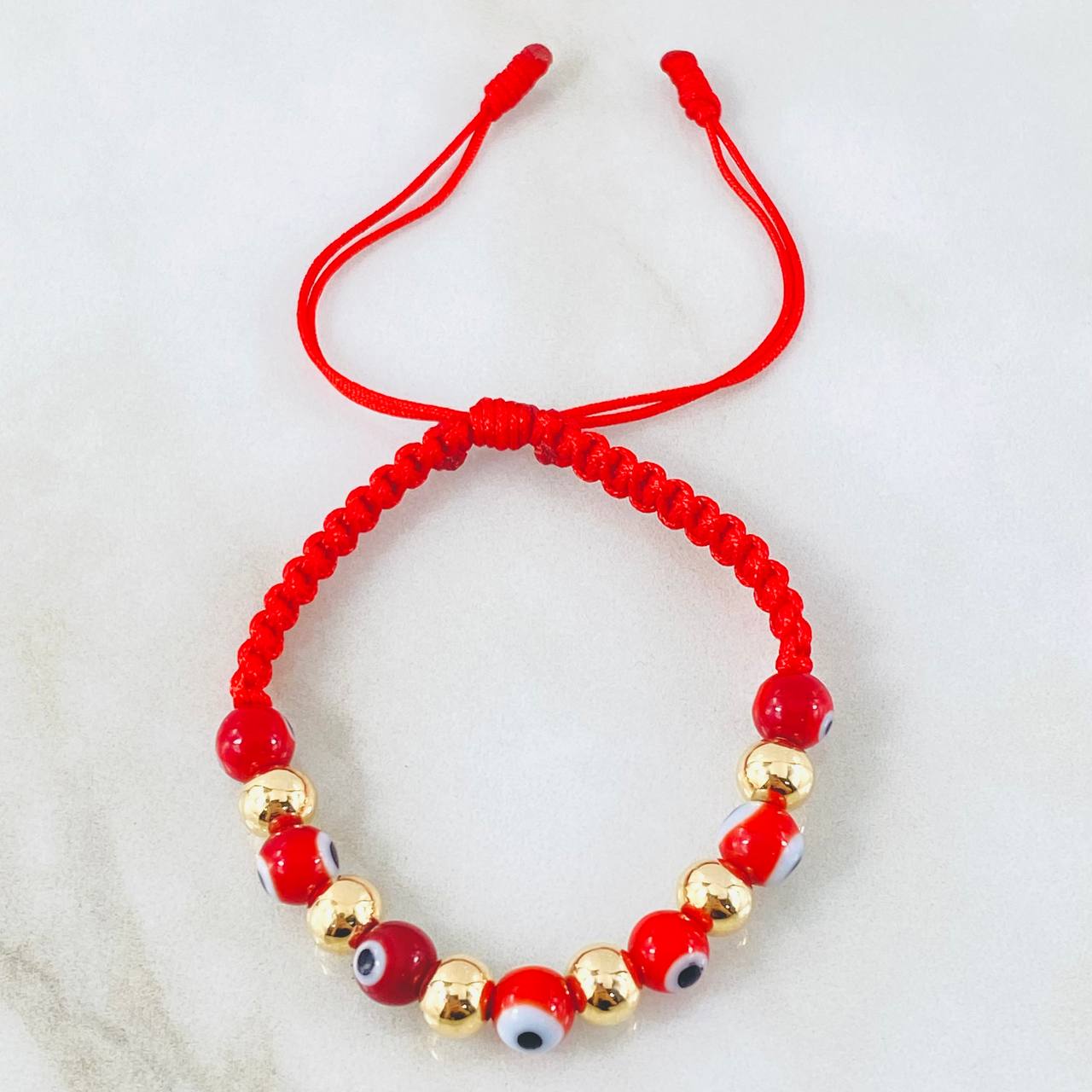 Pulsera Roja Ojos Turcos 1.25gr / Oro Amarillo 18K *