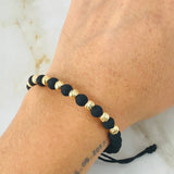 Pulsera Negra Bolas 5mm Diamantadas 8 und Oro Amarillo 18K (A.C)