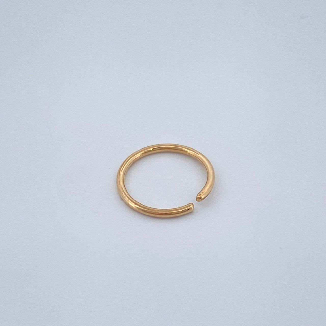 Piercing Aro Liso 0.25gr / 1/2 in / Oro Amarillo 18K $