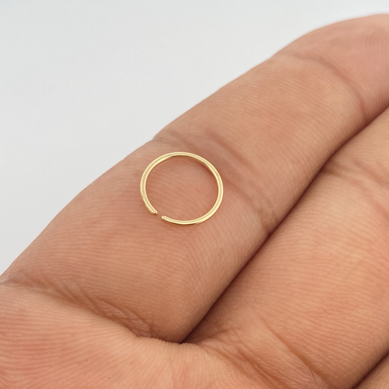 Piercing Aro Liso 0.2gr / 1/2 in / Oro Amarillo 18K $