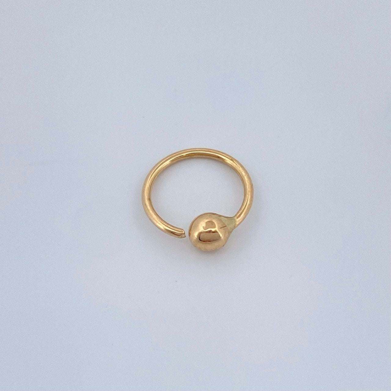 Piercing Aro Bola 0.25gr / 1/2 in / Oro Amarillo 18K $