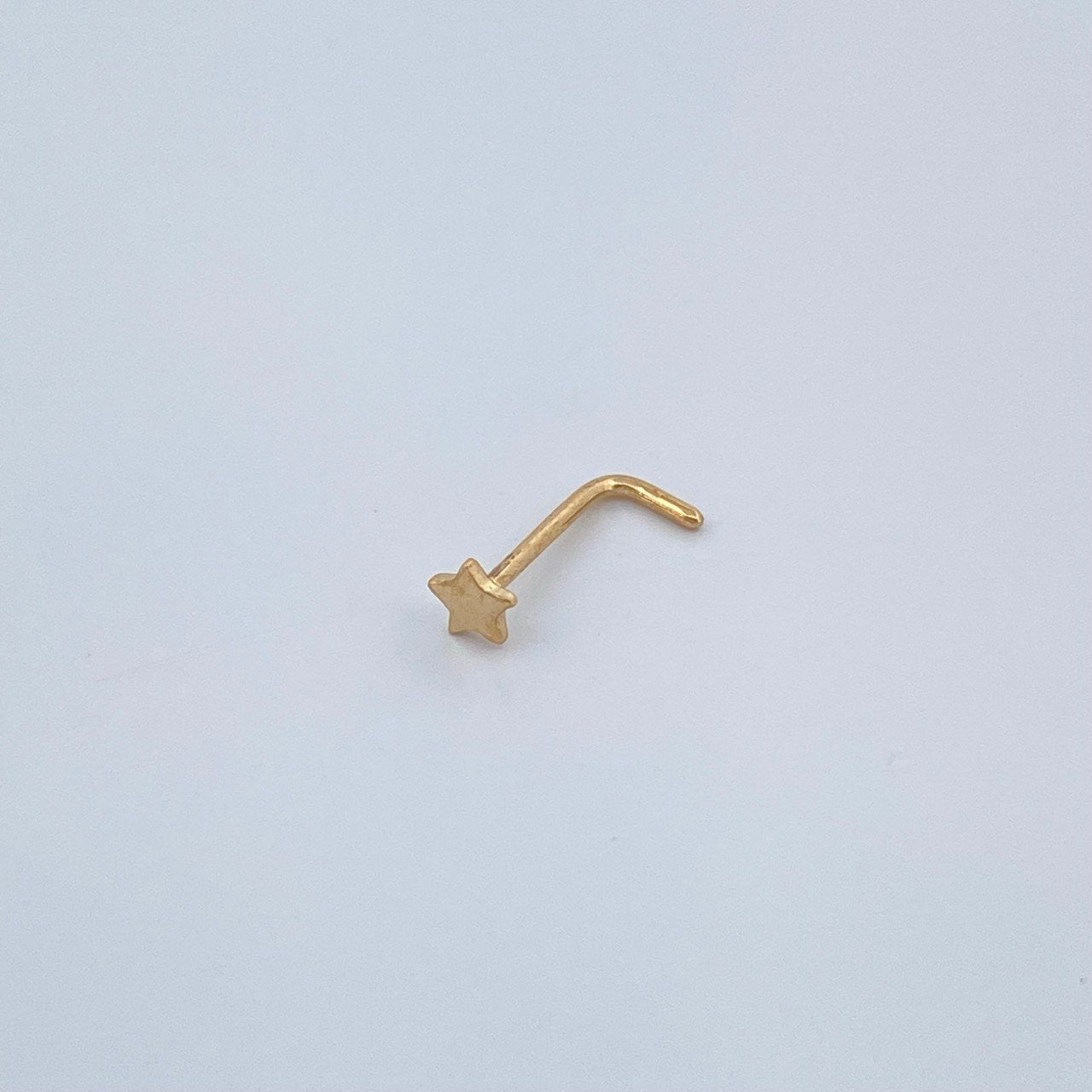 Piercing Chispa Estrella 0.1gr / 1/4 in / Oro Amarillo 18K $