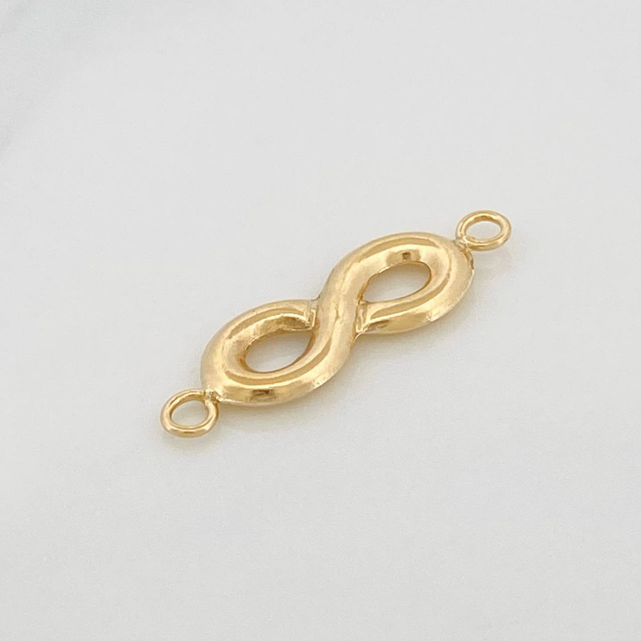 Herraje Infinito 0.65gr / 1 in / Oro Amarillo 18K &