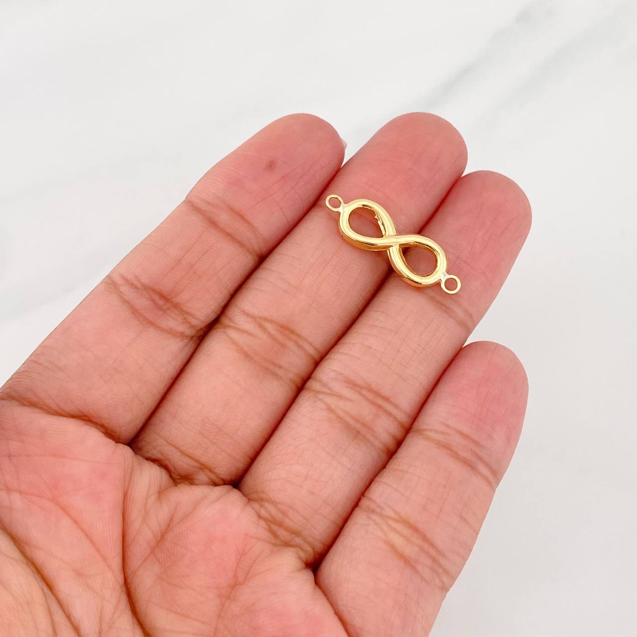 Herraje Infinito 0.65g / 3/4 in Oro Amarillo 18K