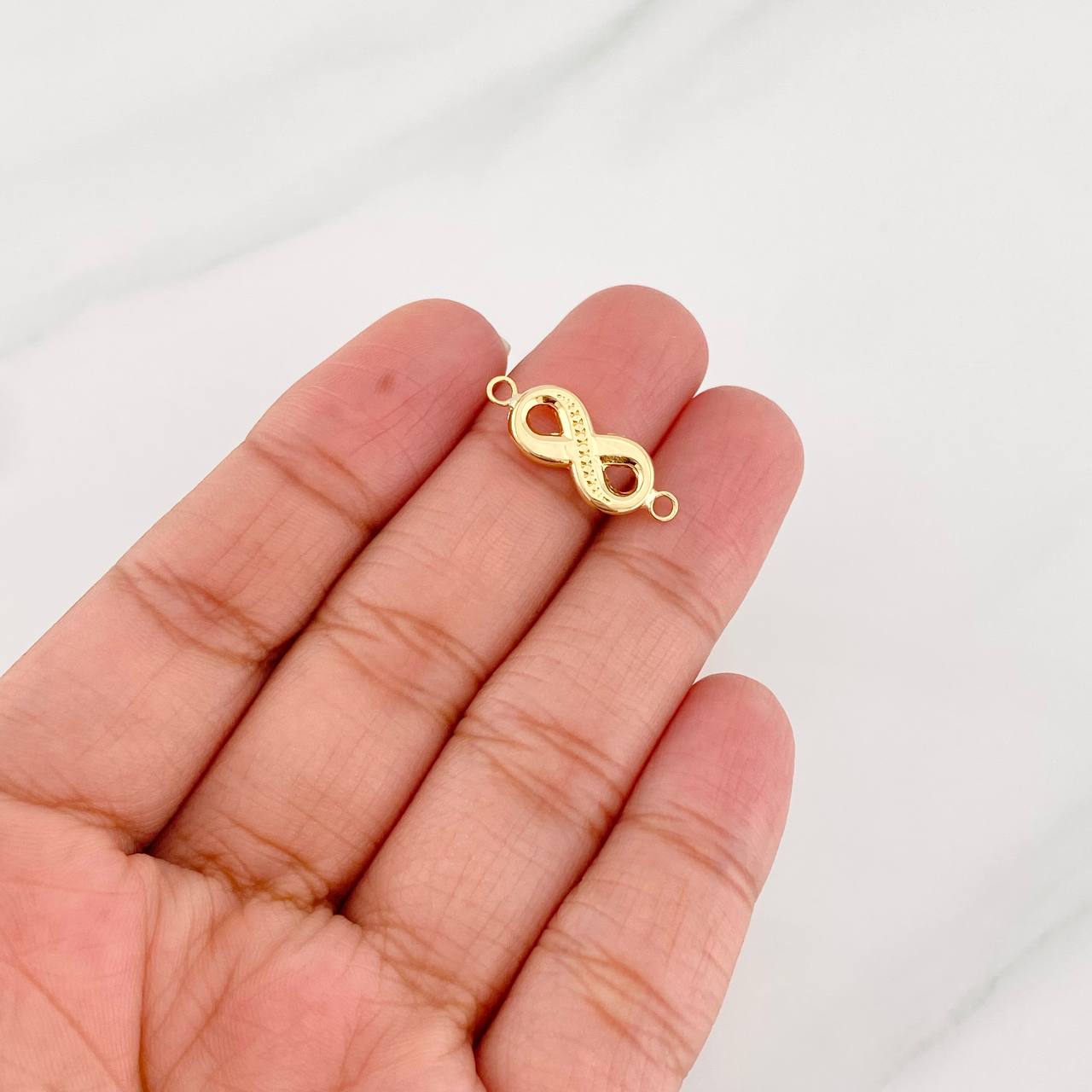 Herraje Infinito 0.55g / 3/4 in Oro Amarillo 18K