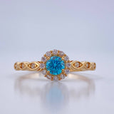 Anillo Solitario Halo Flor Ojos 1.85gr / T7 / Oro Amarillo 18K &