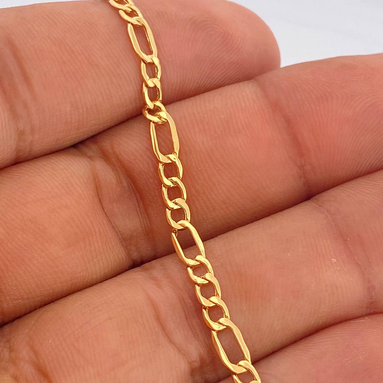 Pulso Figaro 1.95gr / 7 3/4 in / 3mm Oro Amarillo +1 18K $