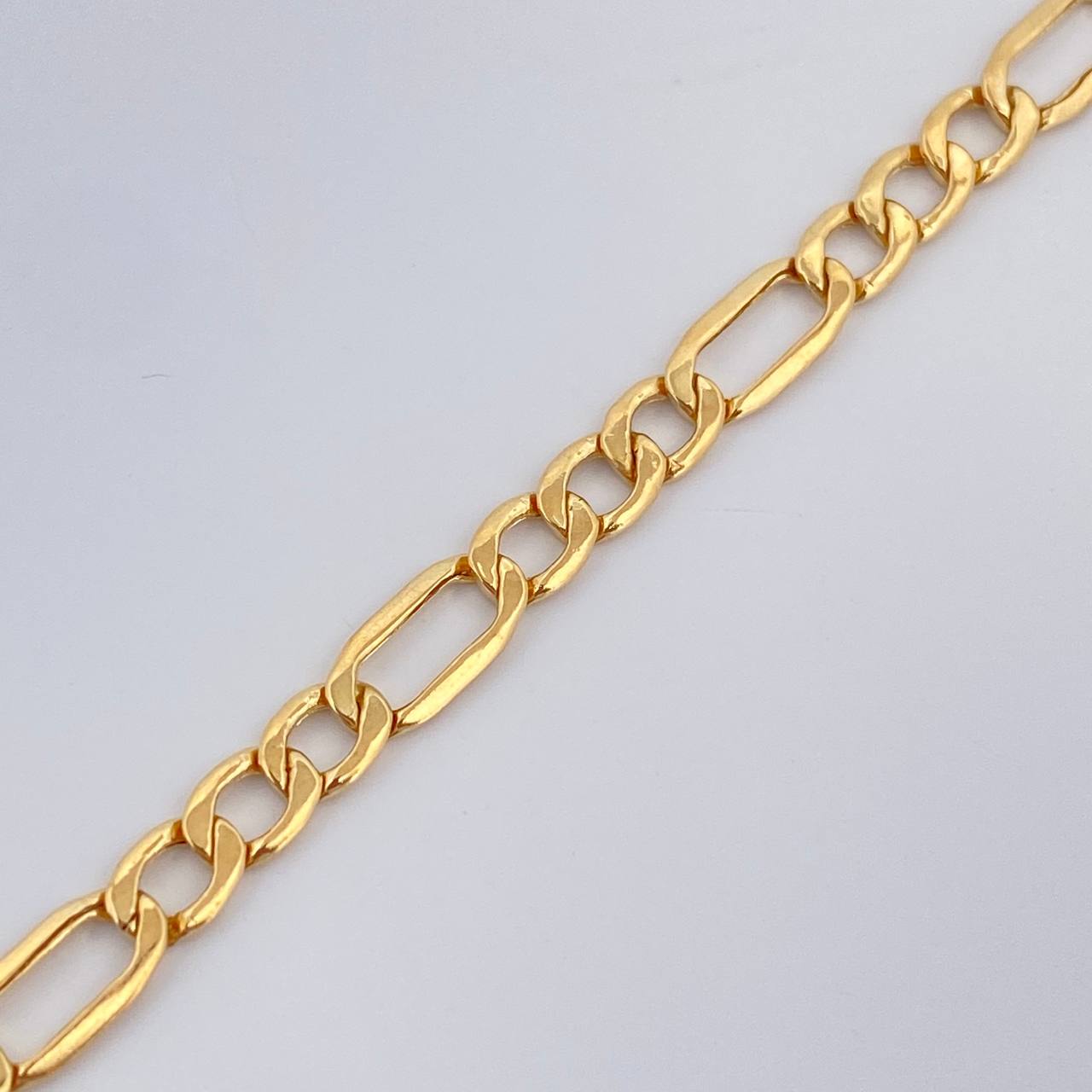 Pulso Figaro 1.95gr / 7 3/4 in / 3mm Oro Amarillo +1 18K $