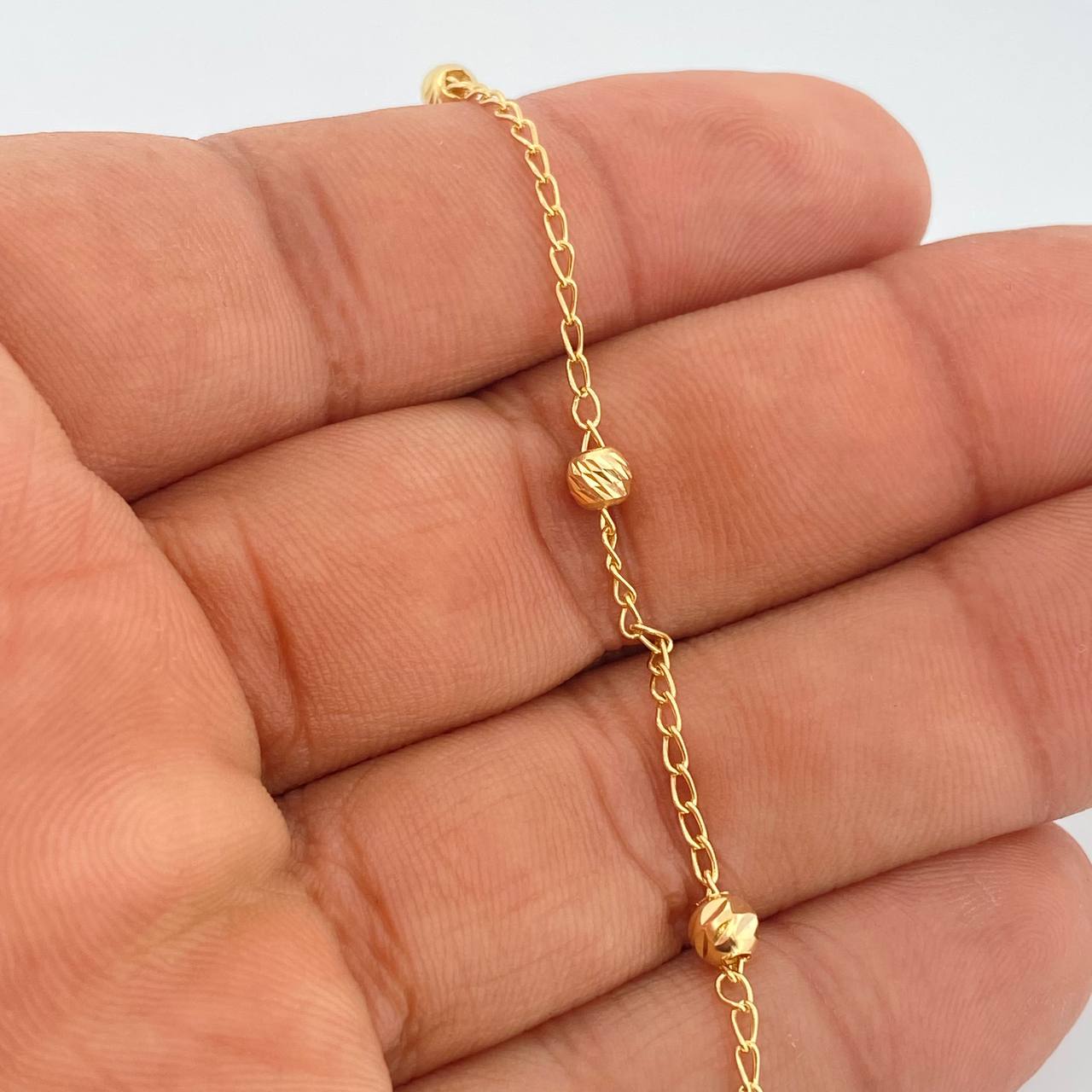 Tobillera Espiga 1.9gr / 9 3/4 in / 4mm Oro Amarillo 18K $