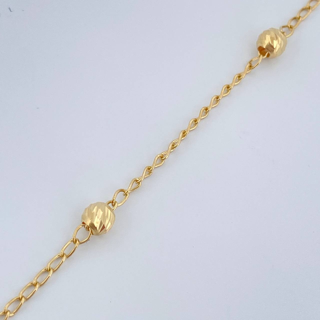 Tobillera Espiga 1.9gr / 9 3/4 in / 4mm Oro Amarillo 18K $