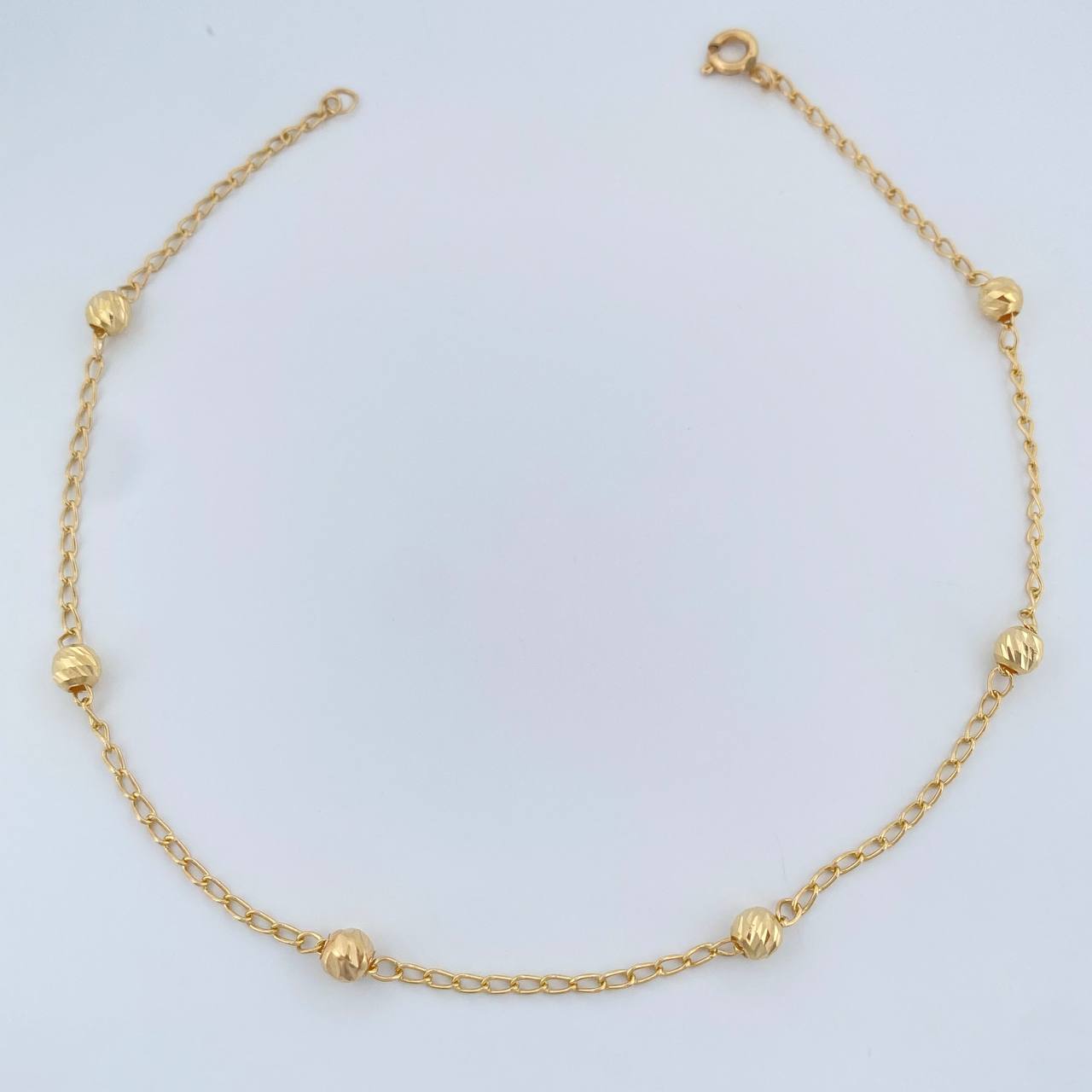 Tobillera Espiga 1.9gr / 9 3/4 in / 4mm Oro Amarillo 18K $