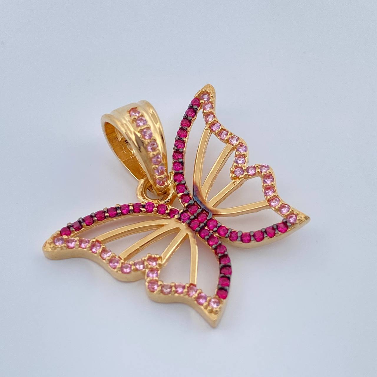 Dije Mariposa 2.95gr / 3/4 in / Dos Oros Negro Amarillo 18K $