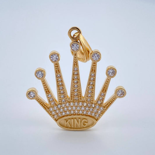 Dije Corona King 4.35gr / 1 3/4 in / Oro Amarillo 18K $