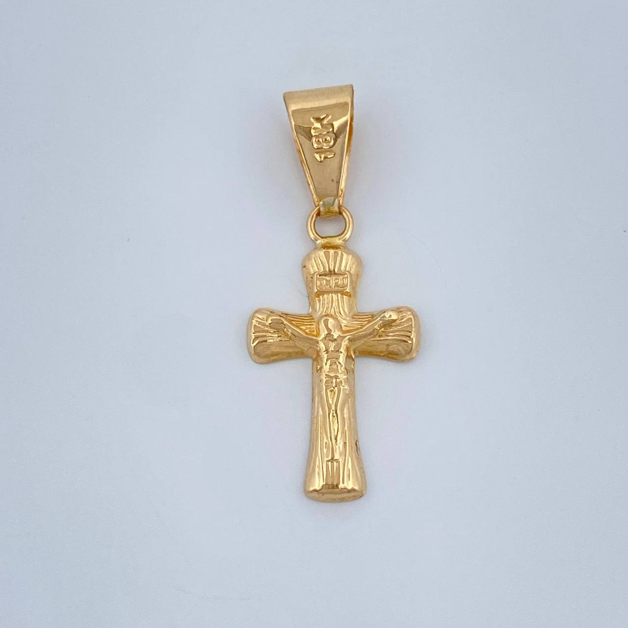 Dije Cruz Cristo 0.6gr / 1 in / Oro Amarillo 18K %