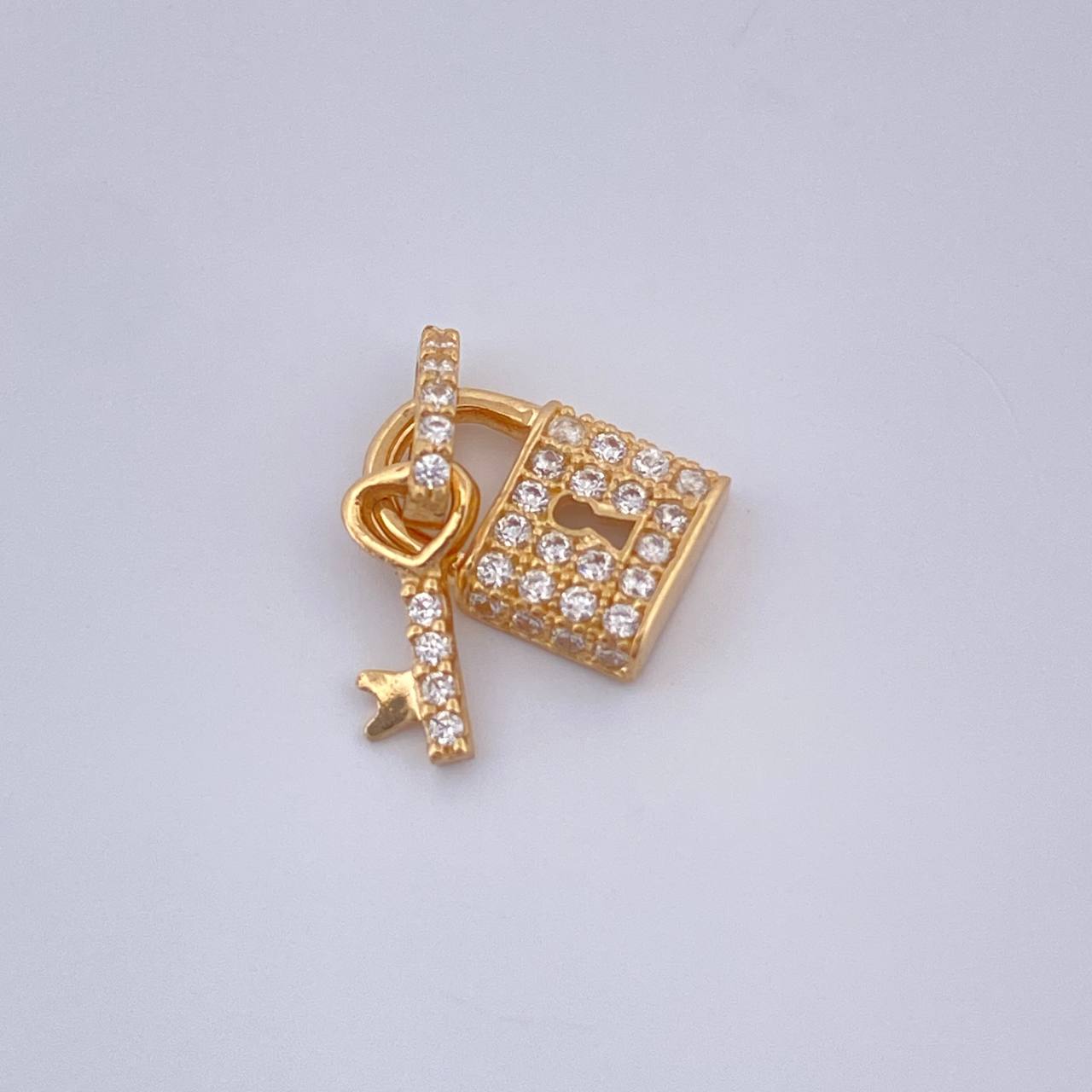Dije Candado 1.05gr / Oro Amarillo 18K %