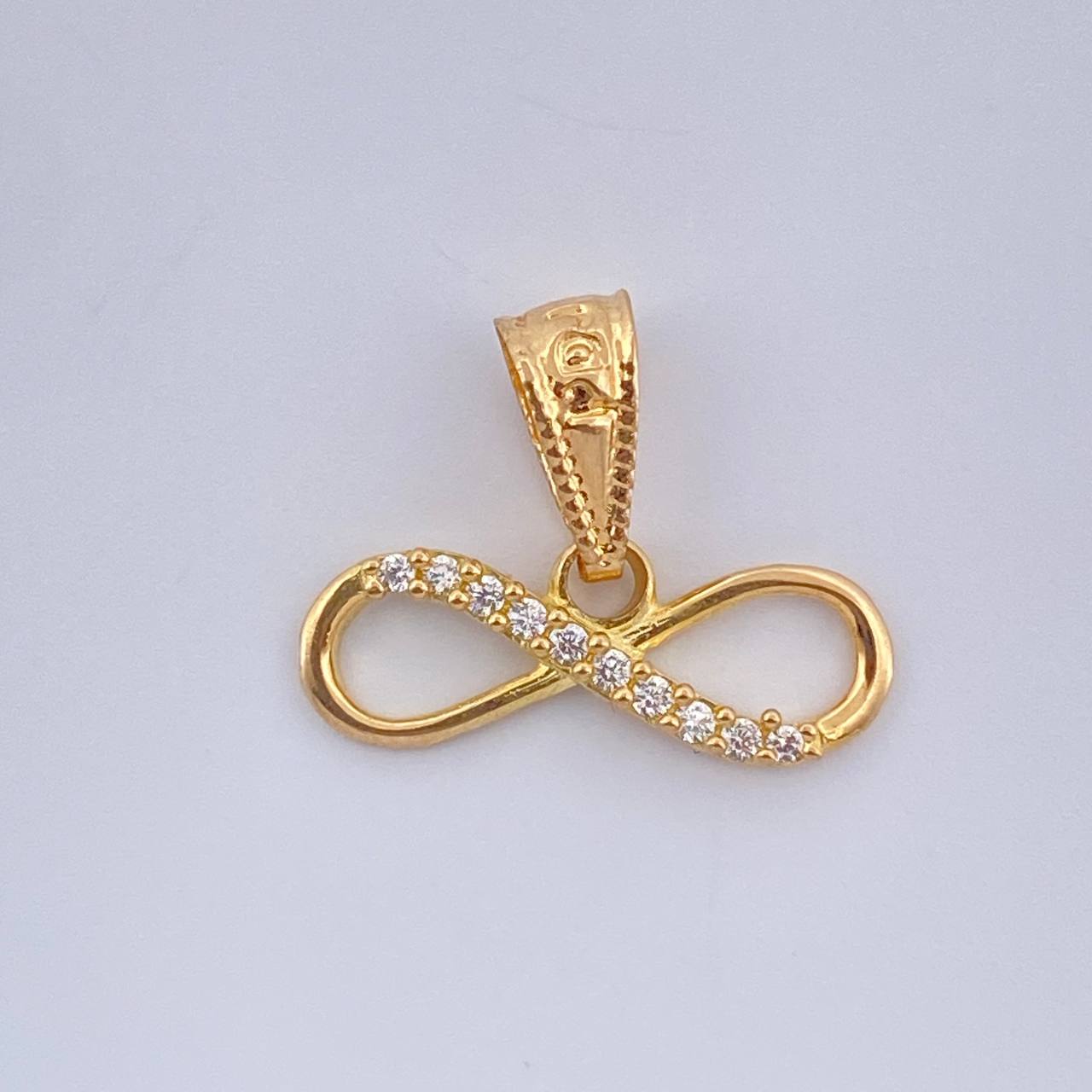 Dije Infinito 0.55gr / Oro Amarillo 18K %