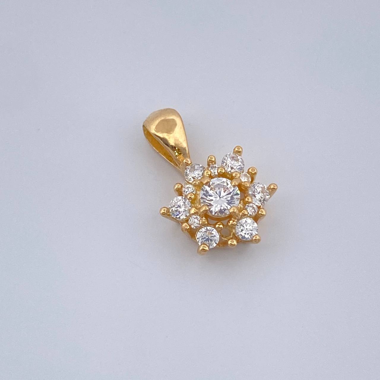 Dije Flor 0.85gr / Oro Amarillo 18K %
