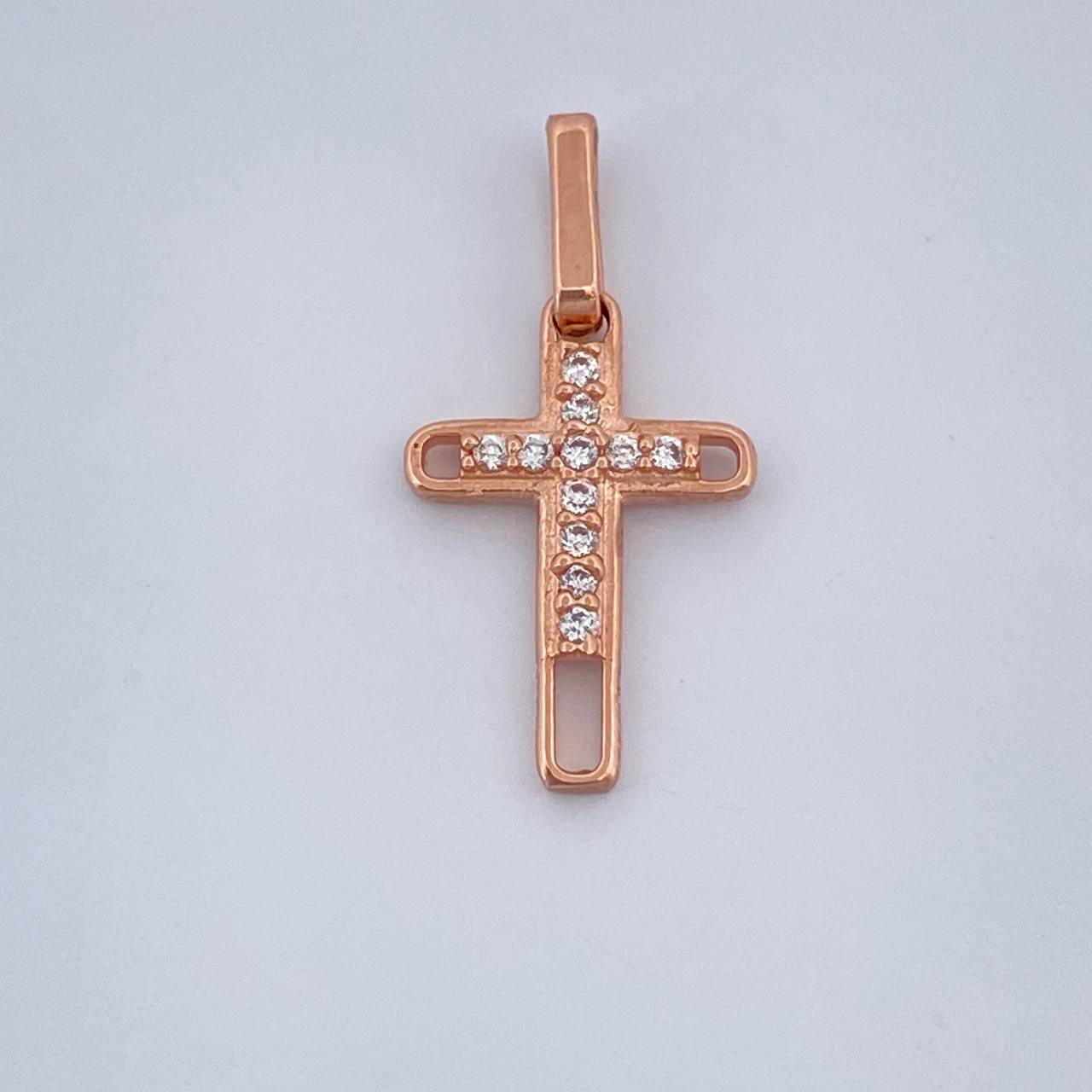 Dije Cruz 0.6gr / Oro Rosa 18K %