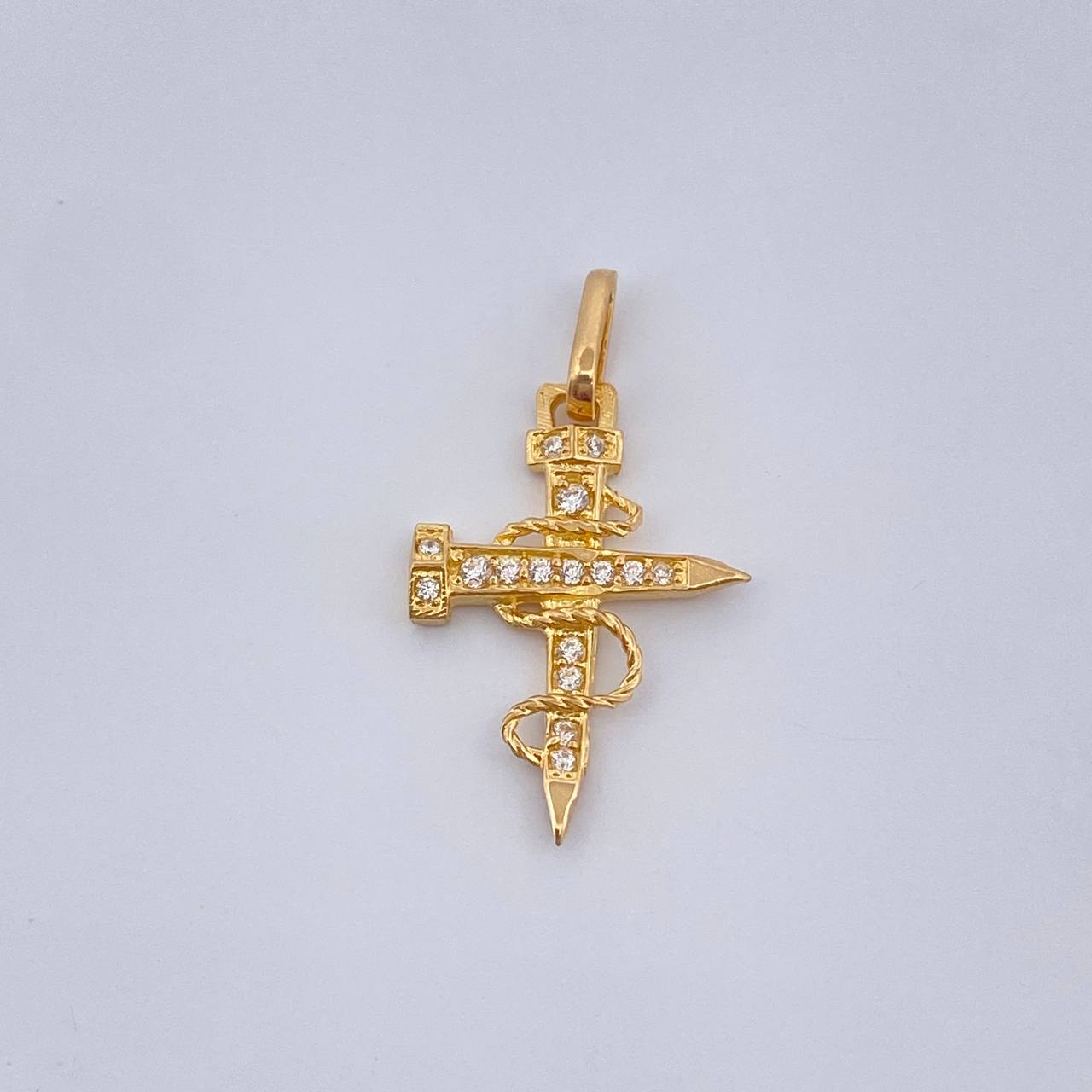 Dije Cruz Clavo 0.85gr / Oro Amarillo 18K %