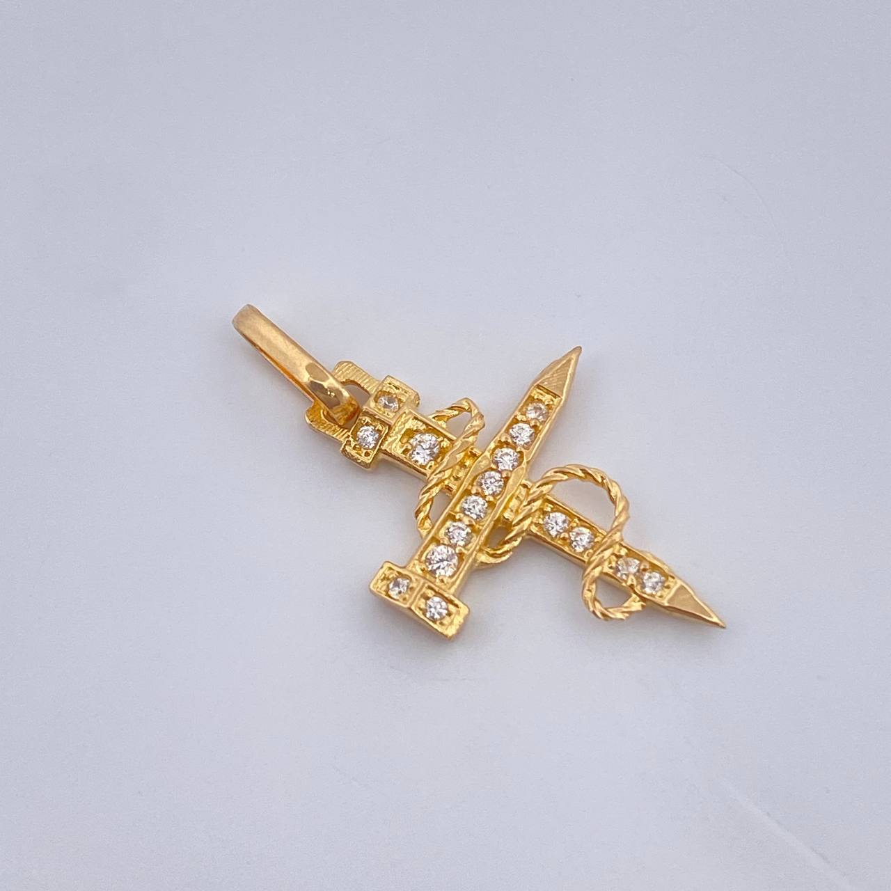 Dije Cruz Clavo 0.85gr / Oro Amarillo 18K %