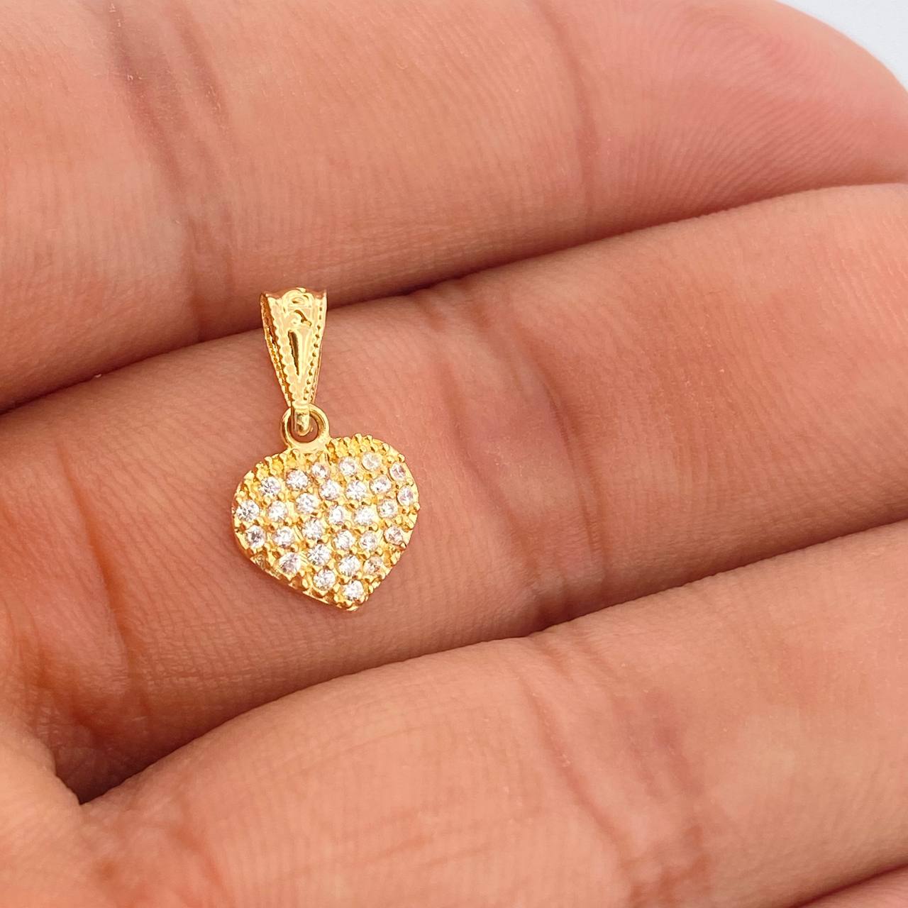 Dije Corazon Tupido 0.6gr / Oro Amarillo 18K %