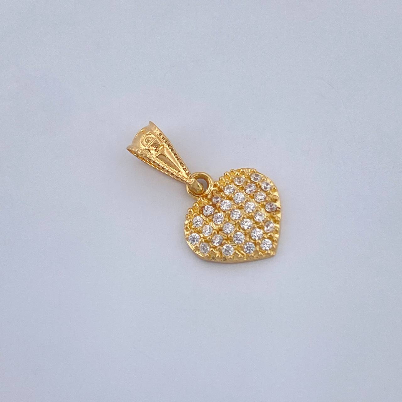 Dije Corazon Tupido 0.6gr / Oro Amarillo 18K %