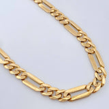 Figaro Chain 31.25gr / 24 1/4 in / 7mm 18K Yellow Gold %