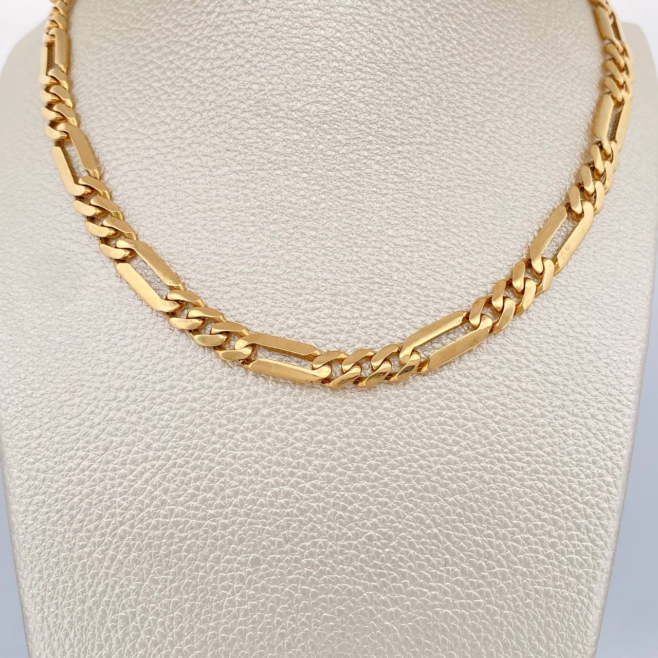 Figaro Chain 31.25gr / 24 1/4 in / 7mm 18K Yellow Gold %