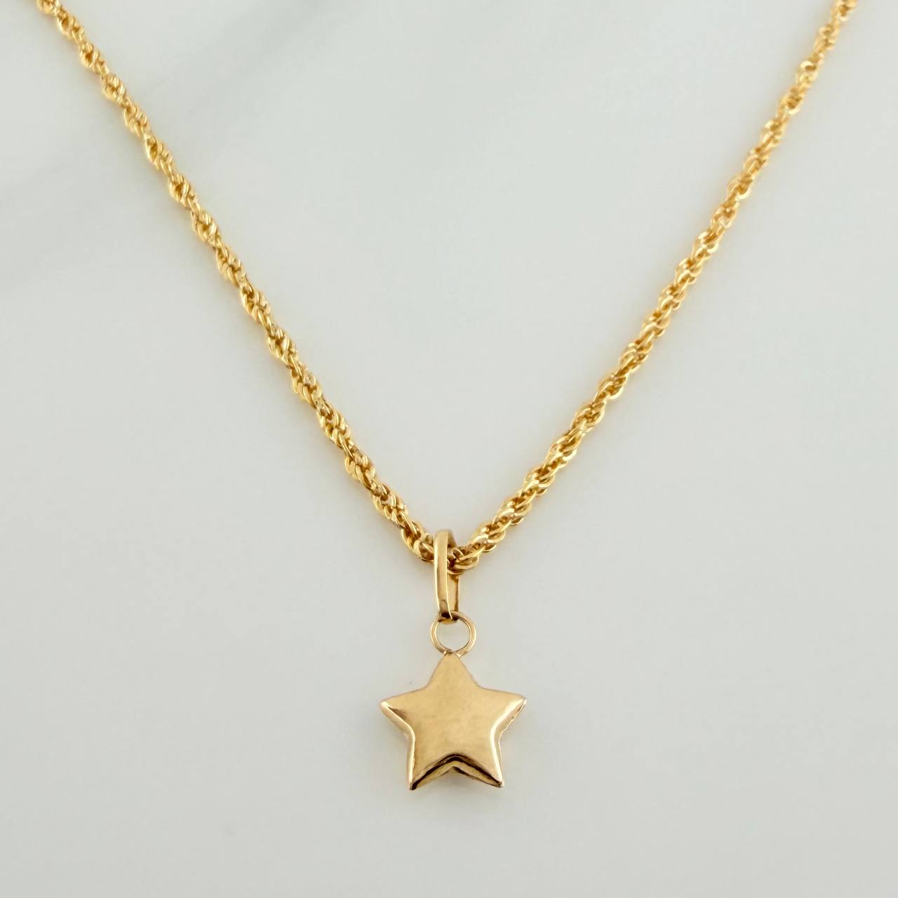 Set Cadena y Dije Lazo + Estrella 1.35gr / 15 3/4 in / 1.39mm Oro Amarillo 18K (Oferta) &