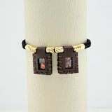 Pulsera Tejida Negra Escapulario Cilindros Diamantados 6Und Oro Amarillo 18K