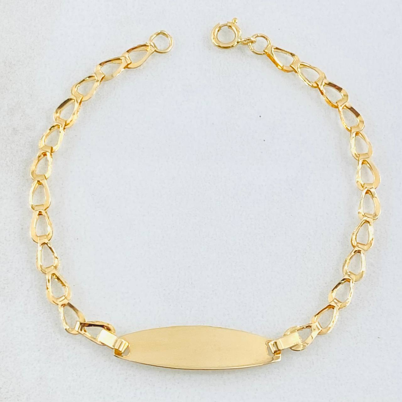 Pulso Bebé Espiga Placa Ovalada 1gr / 5 in / Oro Amarillo 18K