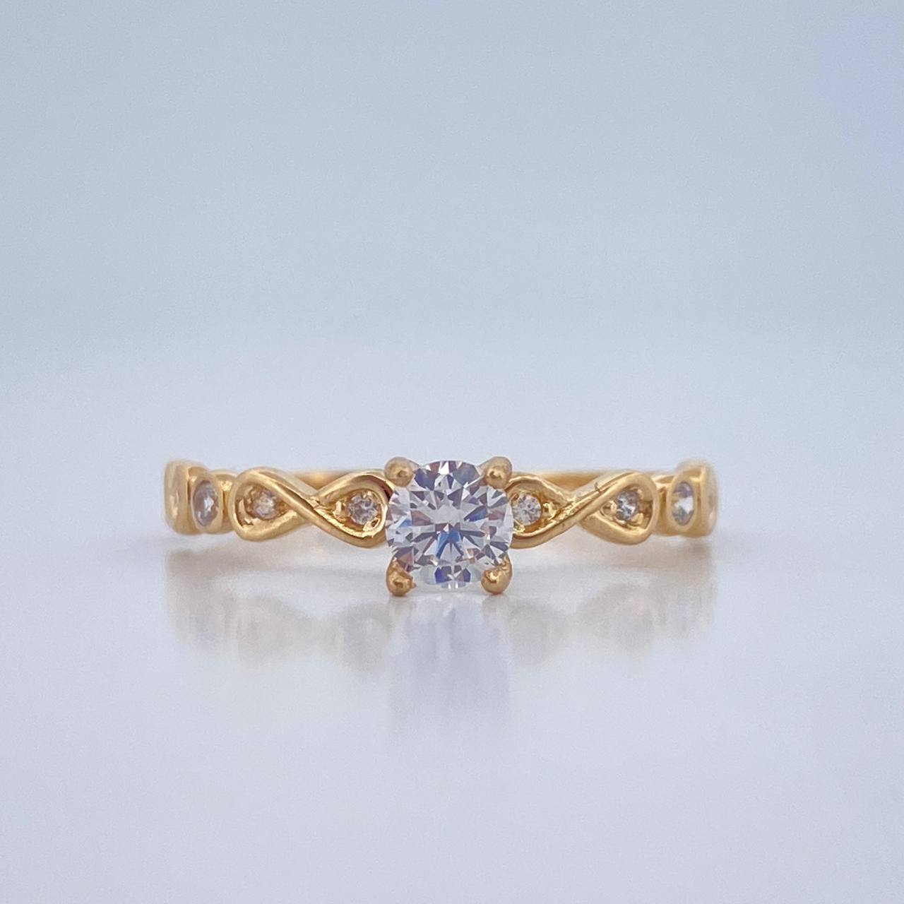 Solitaire Ring Infinitos 1.35gr / T7 / Yellow Gold 18K %