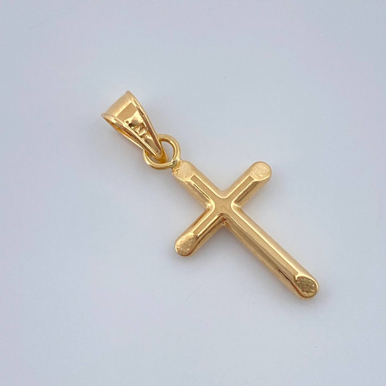 Dije Cruz 0.4gr / 3/4 in / Oro Amarillo 18K %