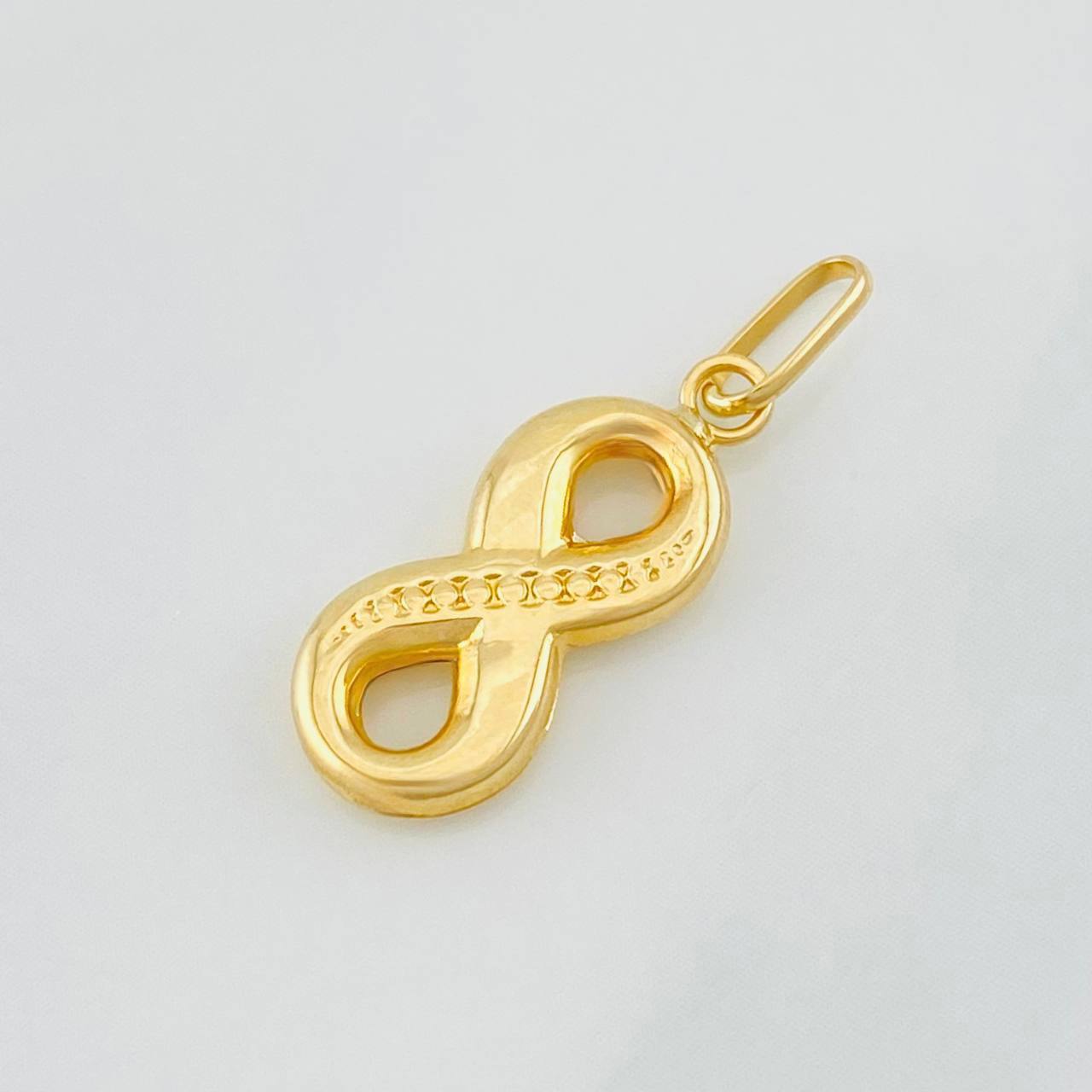 Dije Infinito 0.6g / 1 in Oro Amarillo 18K