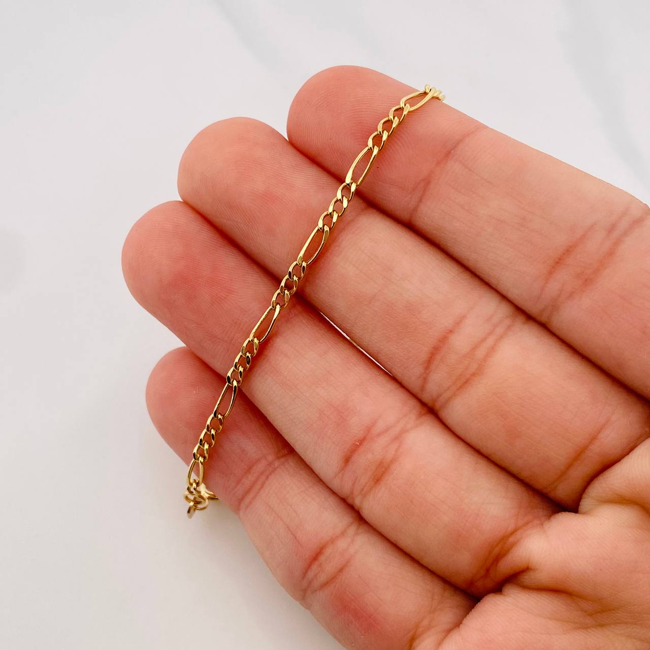 Figaro Bracelet 1.15g / 7 3/4 in / 2.1mm 18K Yellow Gold
