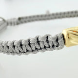 Pulsera Tejida Gris Escapulario Cilindros Diamantados 6 Und Oro Amarillo 18K