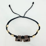 Pulsera Tejida Negra Escapulario Cilindros Diamantados 6Und Oro Amarillo 18K