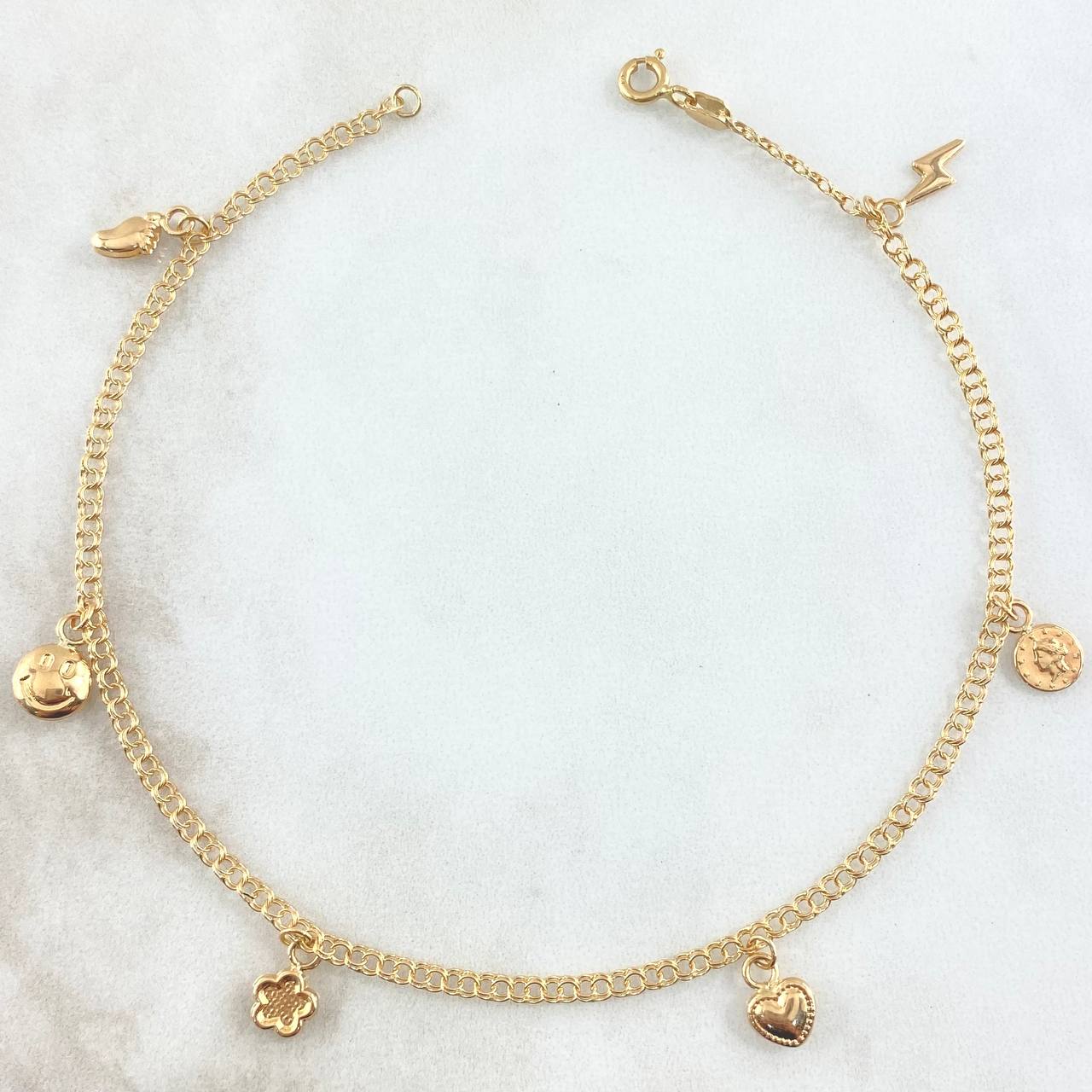 "Ankle Bracelet Aro Seguido 3.55gr / 24.5cm / 2.2mm Happy Face-Flower-Heart-Queen Face-Lightning Yellow Gold 18K"