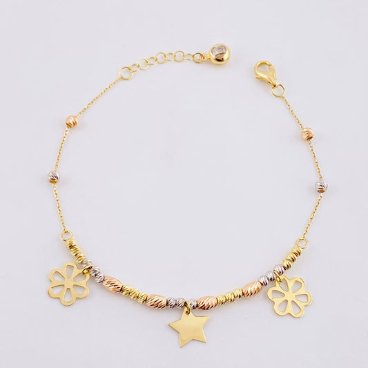 Pulso Aro Seguido Dije Flores y Estrella 3.7g / 7 1/4 in / 3mm Tres Oros 18K
