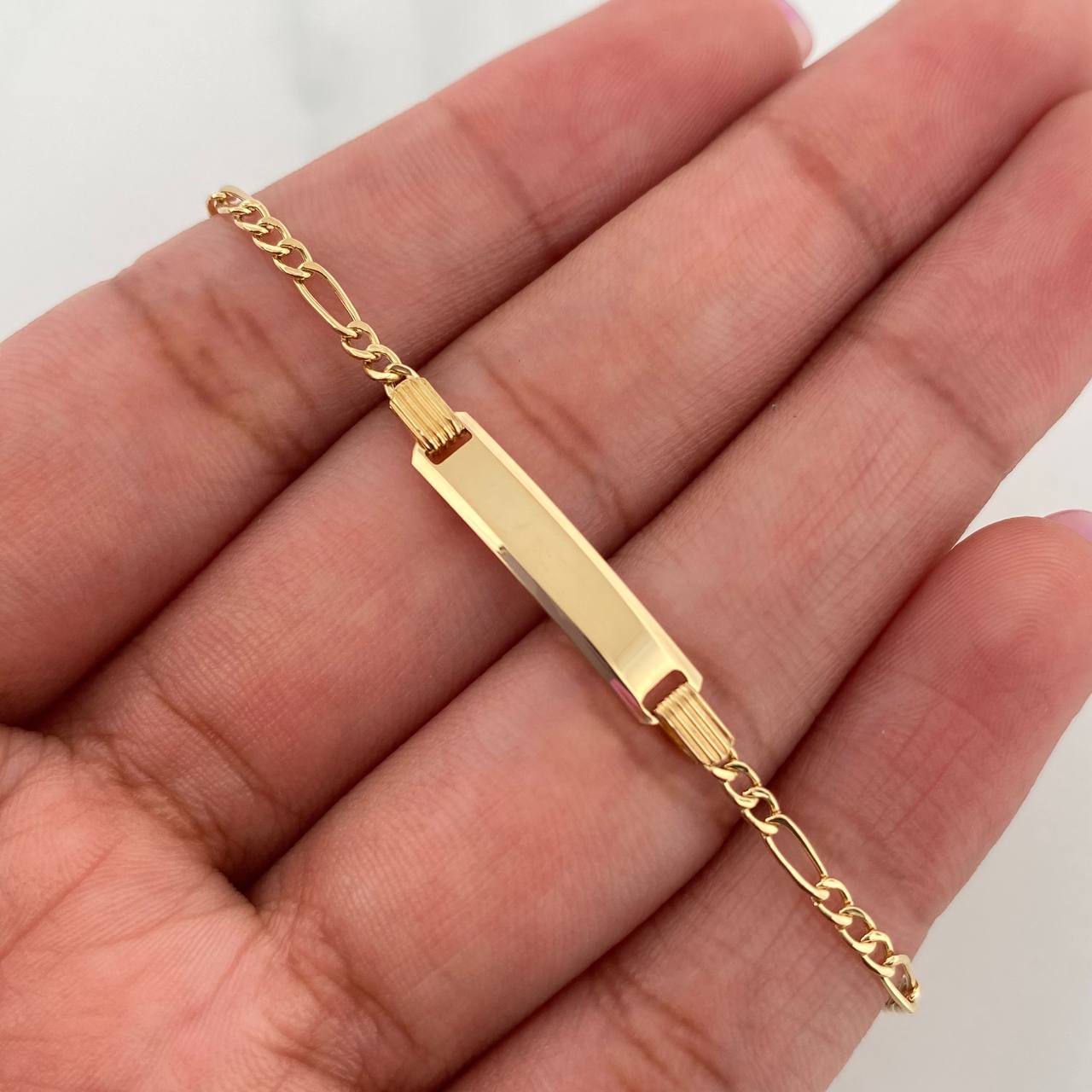 Pulso Figaro Placa Rectangular 1.55 g / 6 1/4 in / 1.1 mm Oro Amarillo 18K