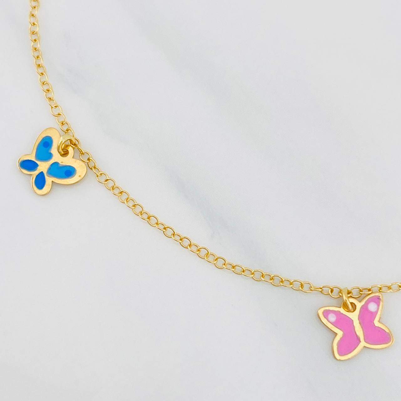 Pulso Bebé Rolo Mariposas 1.45g / 6 in / 1.32mm Oro Amarillo 18K
