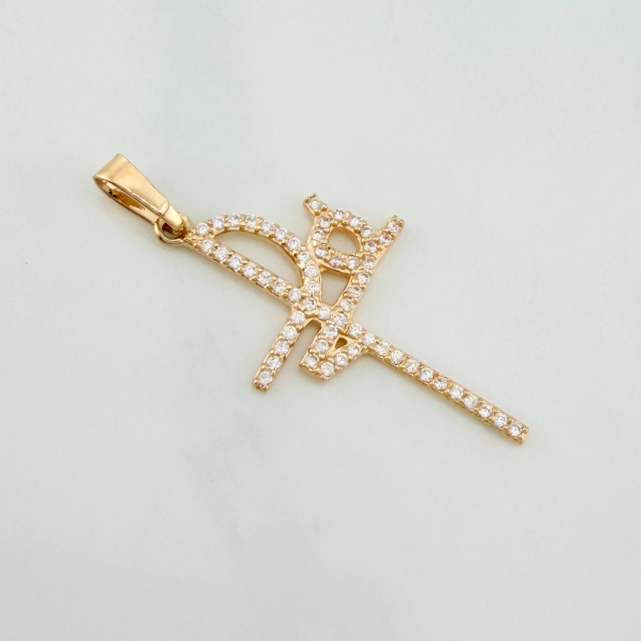 Dije Fe 1.35 g / 3/4 in Oro Amarillo 18K