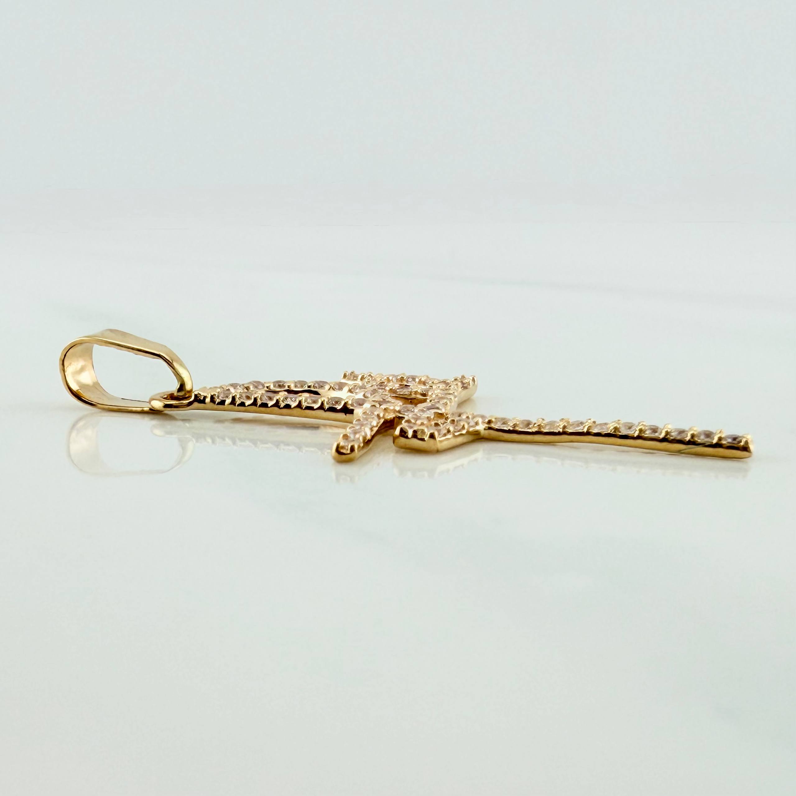Dije Fe 1.35 g / 3/4 in Oro Amarillo 18K