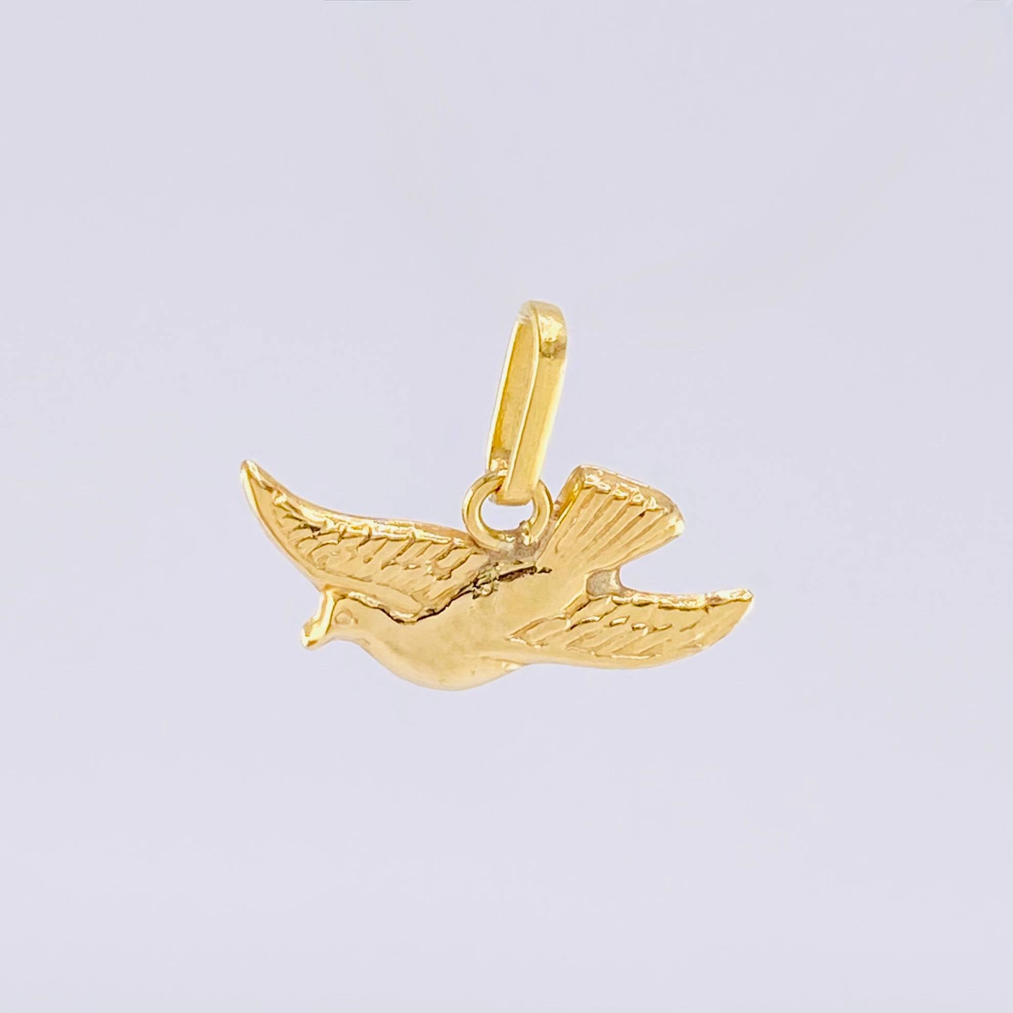 Dije Paloma 0.6gr / 1.3cm / Oro Amarillo 18K